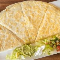 Quesadilla · Flour tortilla filled with melted cheese and your choice of meat.