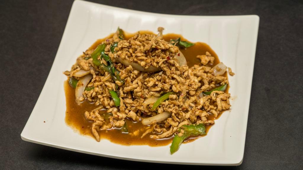 E9. Basil Chili · Mild Spicy.  Wok-fried with bell pepper, onion, basil in chili garlic sauce and a choice of meat.