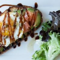 Avocado Toast · Sourdough toast with avocado, over-medium egg, & smoked salmon drizzled with a balsamic redu...