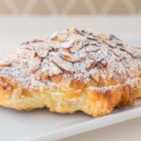 Almond Croissant · Filled with frangipane & almonds, topped with powdered sugar & more almonds!