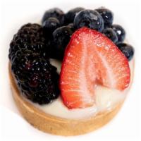 Fruit Tart · Filled with a vanilla pastry cream & topped with assorted berries