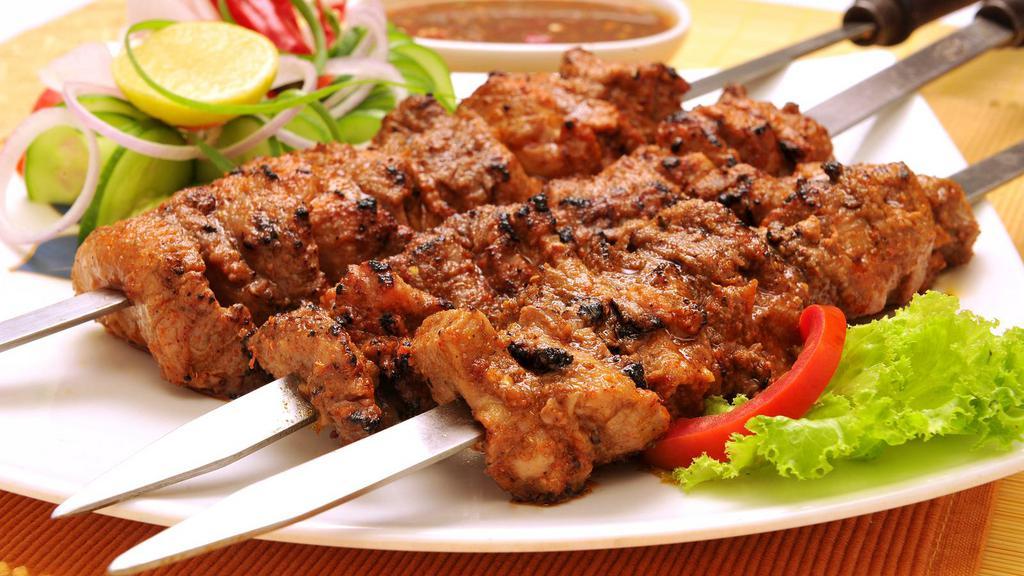 Chicken Tikka Kabab · Mouthwatering, Boneless Chicken Cubes Cooked in a Clay Oven. Served on Skewers.