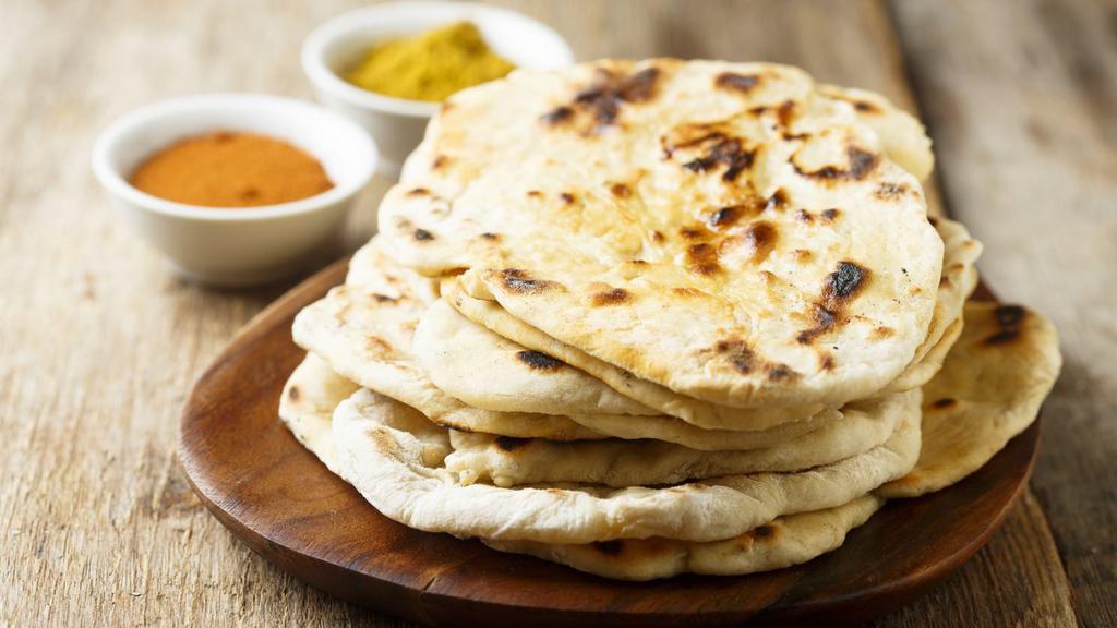 Plain Naan · Classic oven baked bread.