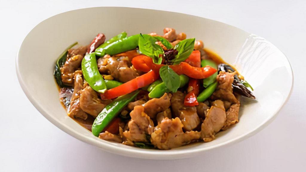 (C) Rangoon Lemongrass Chicken · Wok tossed with chili, garlic, soy sauce, fish sauce, snap peas, red bell peppers and lemongrass; finished with fresh basil.