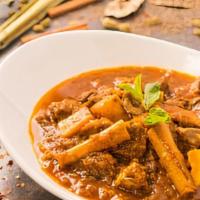 Country-Style Lamb · Lamb in Bagan’s traditional curry with onion, garlic and red chili.