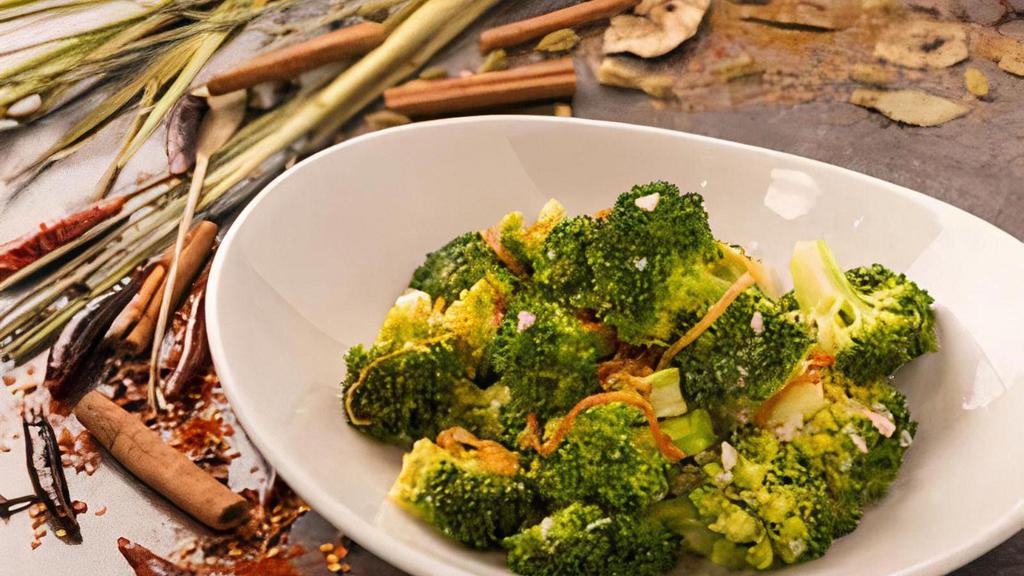 Broccoli & Garlic · Broccoli tossed in wok with white wine, garlic, ginger and garnished with fried onions.