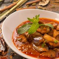 Burmese Eggplant Curry · Fried eggplant curried with onion, garlic and ginger.