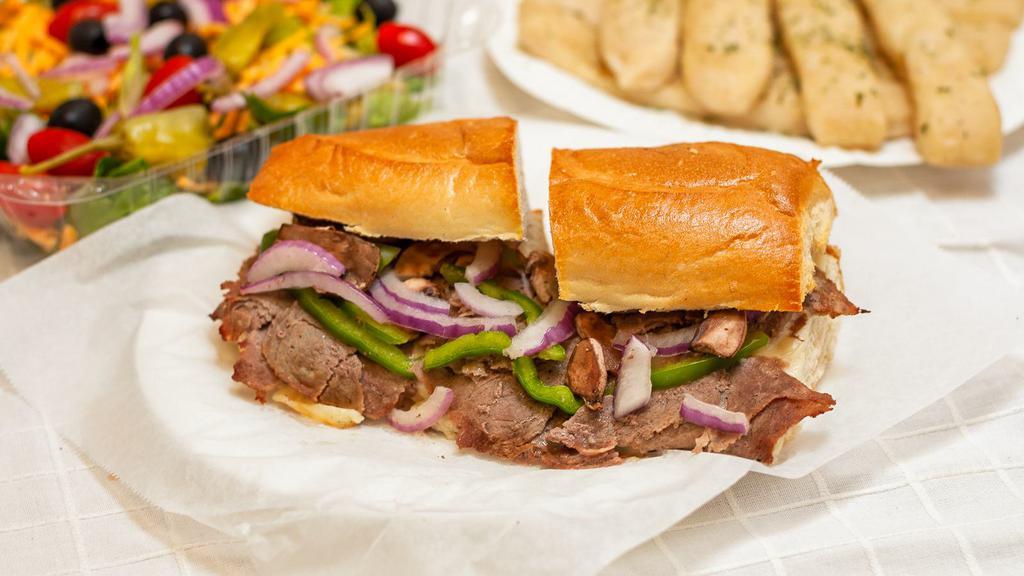 Steak and Onions Sandwich · Thinly-sliced steak, onions,  and provolone cheese.