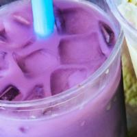 Taro Milk Tea · Sweet, rich, and creamy taro root combined with tropical black milk tea for an amazing and c...