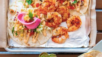 #2 Baja Shrimp Tacos · Grilled shrimp skewers, Slaw, Pico de Gallo, Corn, Cilantro, Lime Crema