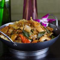 Pad Kee Mao · Mild spiciness. Stir fried wide rice noodles, basil, chili, carrots, bell peppers, cabbage a...