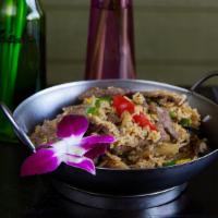 Spicy Fried Rice · Mild spiciness. Fried rice with fresh basil, onions, bell peppers and egg.
