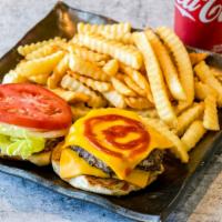 Cheeseburger Combo · Includes fries and drink of your choice.