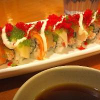 Rainbow Roll · Inside: real crab, avocado

Top: tuna, salmon, hamachi, tai, eel sauce, creamy sauce, tobiko