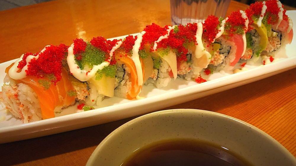Rainbow Roll · Inside: real crab, avocado

Top: tuna, salmon, hamachi, tai, eel sauce, creamy sauce, tobiko