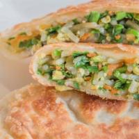 Green Chives Pancake （韭菜盒子） · Pan-fried chive pocket pancake filled with chive, scrambled egg and dry shrimp, also known a...