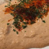 Baba Ghanoush · Smoke roasted eggplant blend with garlic, tahini, lemon, and touch of olive oil. Served with...