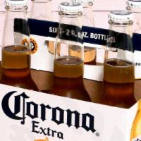 Corona, 6 Packs - 12 oz Bottle Beer (4.5% ABV) · 