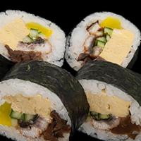 Futomaki Roll · Egg, Sweet Shrimp, Shiitake,
Cucumber, Yellow Radish