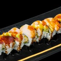 Rainbow Dragon Roll · Top: Tuna, Ebi, Salmon, Izumi-Dai, Unagi Sauce, Tobiko/Masago, Sesame. Inside: Shrimp Tempur...