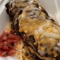 Burrito Maya w/filling · rice , bean topped with mole sauce , sour cream and salsa