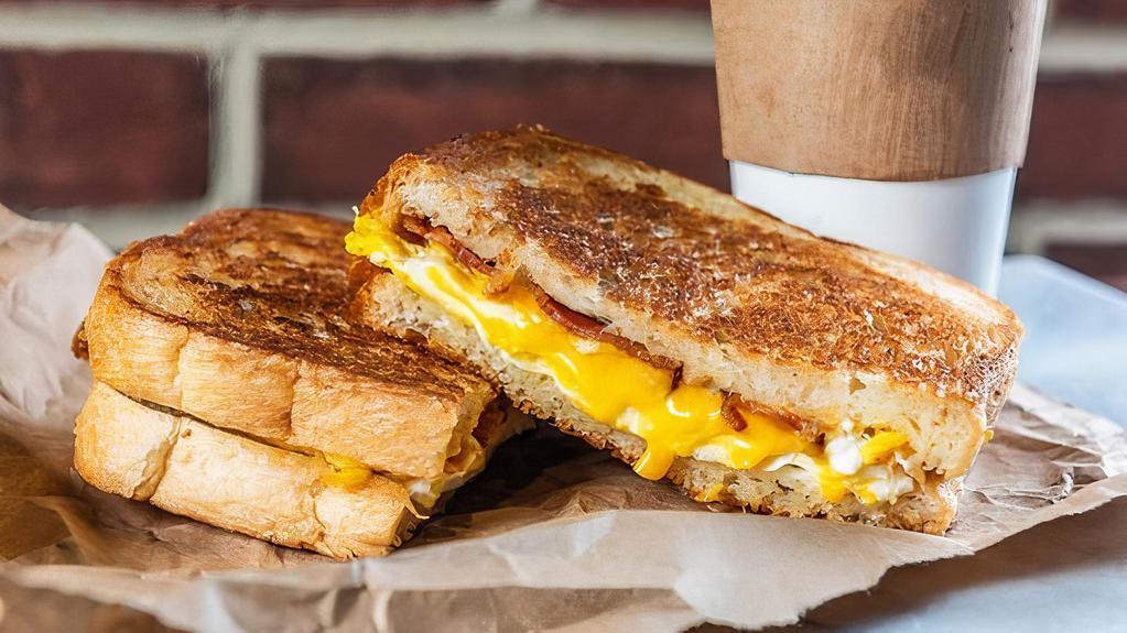 Breakfast Sandwich · 2 Scrambled egg on Buttermilk, Wheat, Sourdough. Choice of Bacon or Sausage. Cheese (American, Provolone, Monterey Jack, or Swiss)