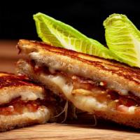 BLT Grilled Cheese with a Kick · Polenta Bread l Calabrian Chili Butter l Pepper Jack l Cherry Wood Smoked Bacon l Local Toma...
