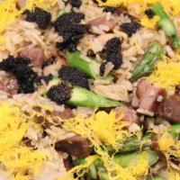 Truffle Beef Mushroom Fried Rice · Includes Egg, Mushroom, Onions, and Asparagus.