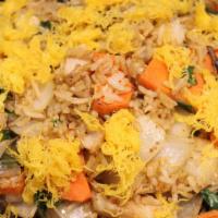 Basil Curry Chicken Fried Rice · Includes Egg, Basil, Onion, and Carrot.