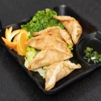 Gyoza (5 Pcs) · Deep fried potstickers with dipping sauce.