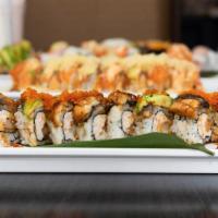 2. Dragon Roll (2 Shrimp) · Shrimp tempura, crab topped with eel, avocado, sauce and tobiko.