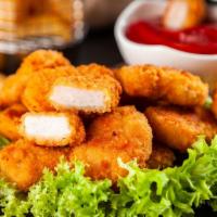 Chicken Nuggets (8 Pieces) · Golden crispy chicken nuggets. Served with French fries.