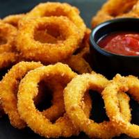 Onion Rings · Crispy golden onions baked and fried.