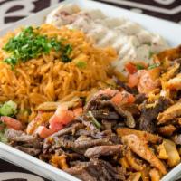 Chicken Shawarma Plate · Marinated chicken served with salad and rice.