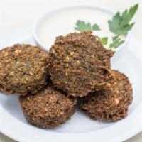 3 Falafel · Three Pieces of fried blend of garbanzo beans, garden fresh cilantro and parsley With Some S...