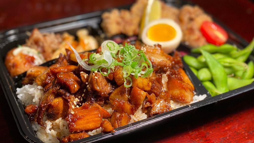 Chashu Pork Bento · New. Tender Chashu Pork over Rice, Edamame, Takoyaki, Egg, Fried Gyoza, Fried Chicken
