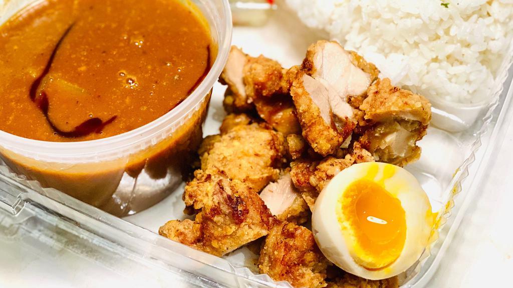 Karaage Curry Rice · Japanese Curry (beef & pork) rice with Salad, Fried Boneless Chicken, and half of soft boiled egg.