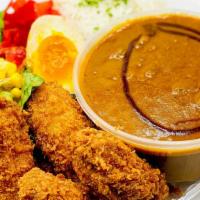 Oyster Curry Rice · Japanese Curry (beef & pork) Rice with Salad, Fried Oyster and half of soft boiled egg.