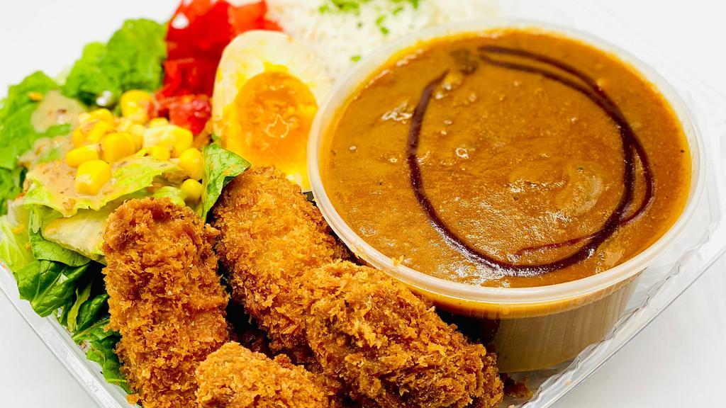 Oyster Curry Rice · Japanese Curry (beef & pork) Rice with Salad, Fried Oyster and half of soft boiled egg.