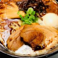 Kuro Tonkotsu Ramen · Traditional Tonkotsu (pork) Broth with black garlic, chashu pork, green onion, soft-boiled e...