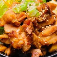 Chashu Don · Roasted pork with green onion and mayonnaise over rice.