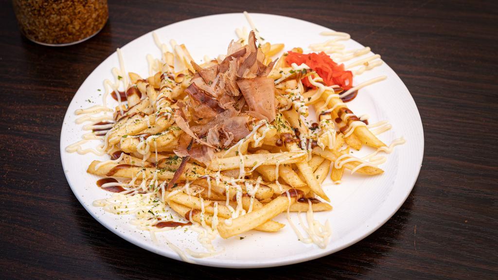 Okonomi Style French Fries · Fried potato with takoyaki sauce, mayonnaise and bonito flakes on top.