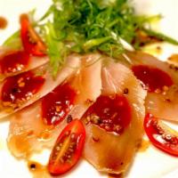 Spicy White Tuna Garlic Carpaccio · white tuna sashimi and sliced garlic onion in spicy sauce
