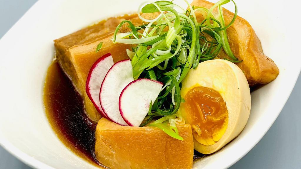 Kakuni (Braised Pork Belly) · Kakuni (Braised Pork Belly) with half boiled egg, green onion and radish.