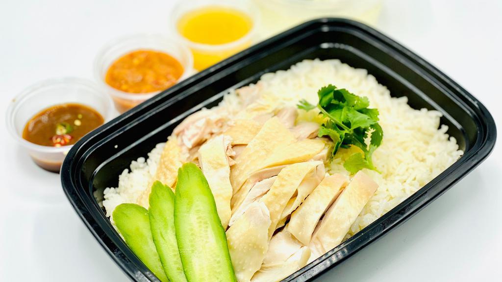 Chicken Rice (Chick-N-Rice)) · Chicken flavored jasmine rice topped with chicken breast and thigh, broccoli  and cilantro, plus chicken soup and one choice of the following sauce (spicy ginger garlic sauce, spicy soy miso sauce or lemon sauce)