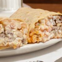 Super Burrito · Your choice of meat, rice, beans, pico de gallo, cheese, sour cream & guacamole.