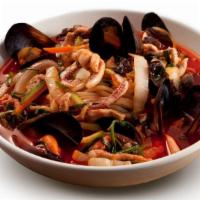 Jjamppong · Korean Noodles with vegetables, pork, and seafood in a spicy broth.

Ingredient: pork, squid...