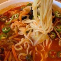 Jjamppongbap · Rice with vegetables, pork, and seafood in a spicy broth.

Same as Jjamppong but with rice i...