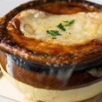 French Onion Soup · 48-hour beef stock, three cheese gratin, sourdough crostini.
