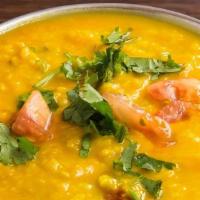 Yellow Dal · Vegetarian. Yellow lentils delicately spiced with garlic, cumin and coriander.